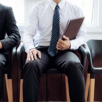 Businessmen waiting for interview